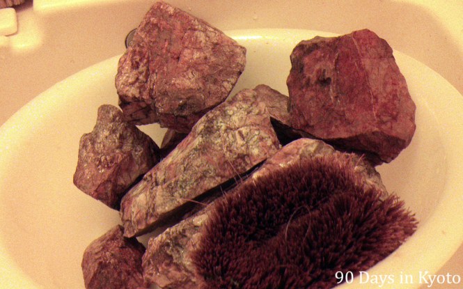 A Tawashi (束子), the traditional Japanese scrub brush can be used for everything in the house - including cleaning stones